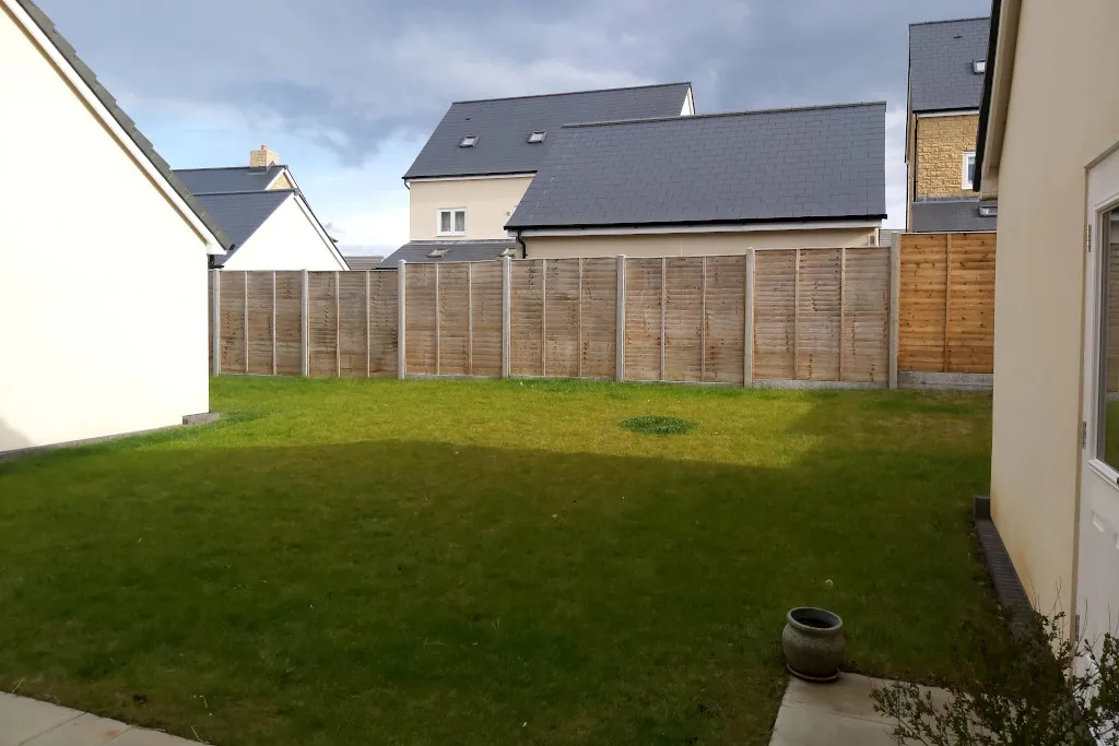 The garden before transformation. The whole garden is turfed with no beds or other features.
